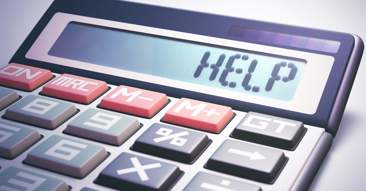 Solar calculator showing on the digital display the word HELP