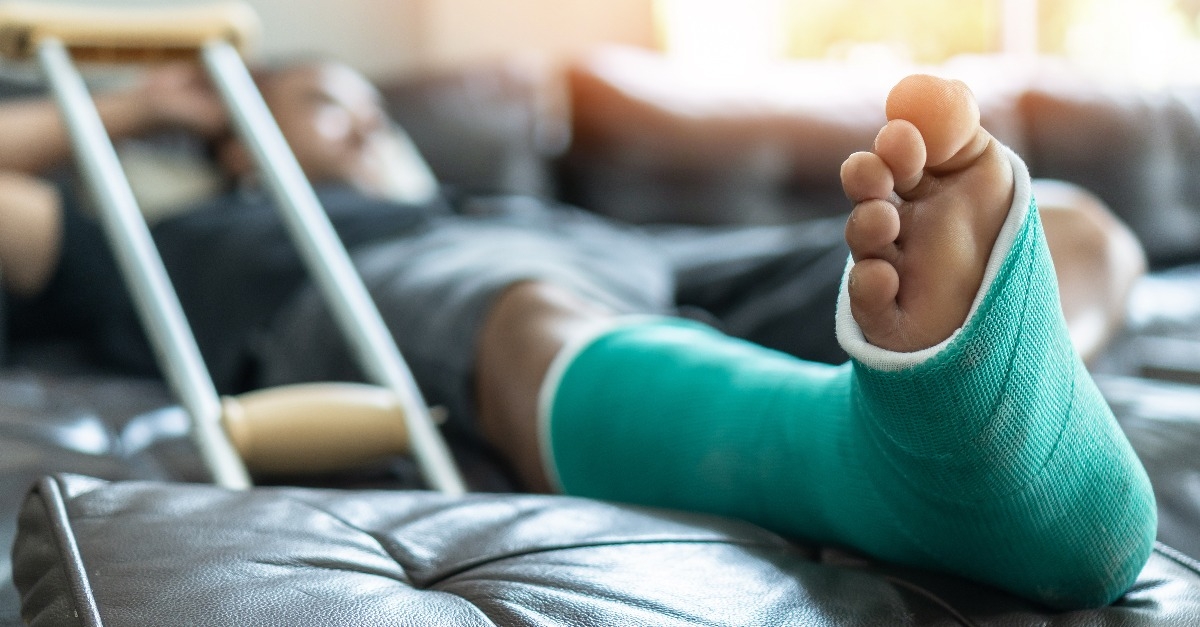 Bone fracture foot and leg on male patient with splint cast