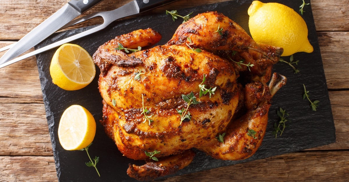 Homemade chicken rotisserie with thyme and lemon