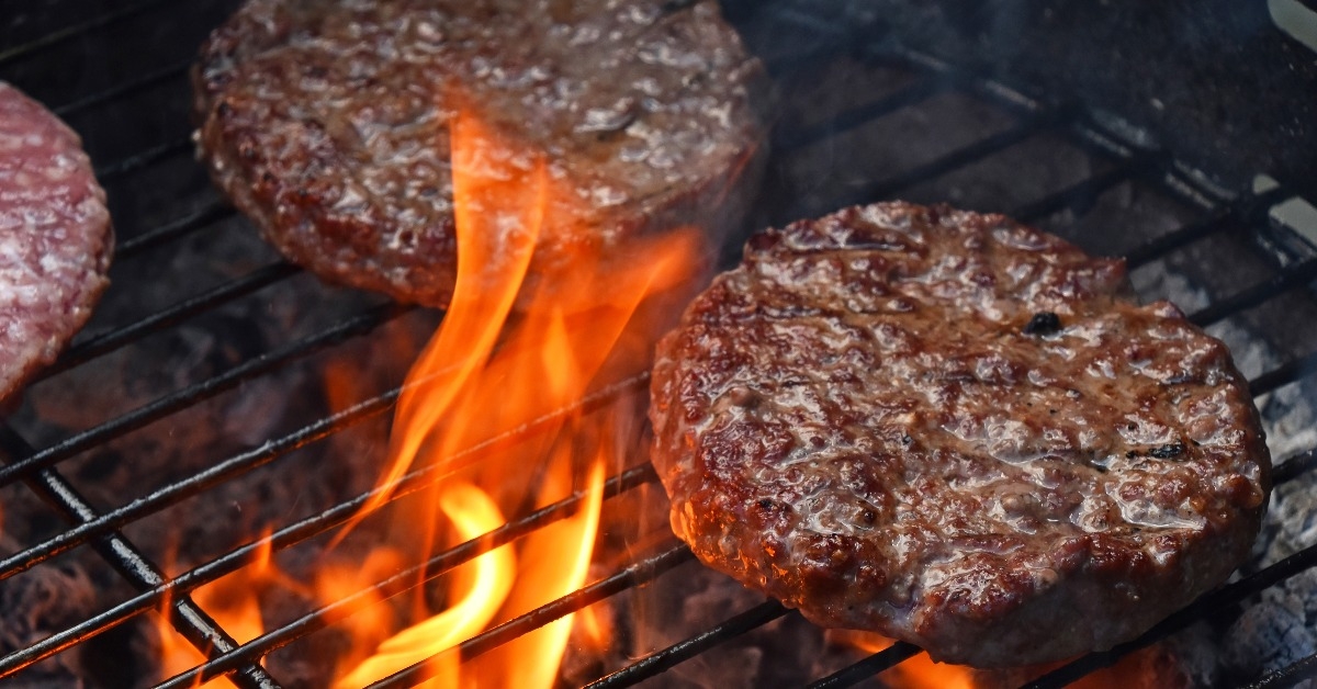 Meat burgers for hamburger grilled on flame grill