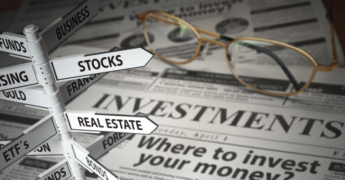 newspaper and direction sign with investment options 