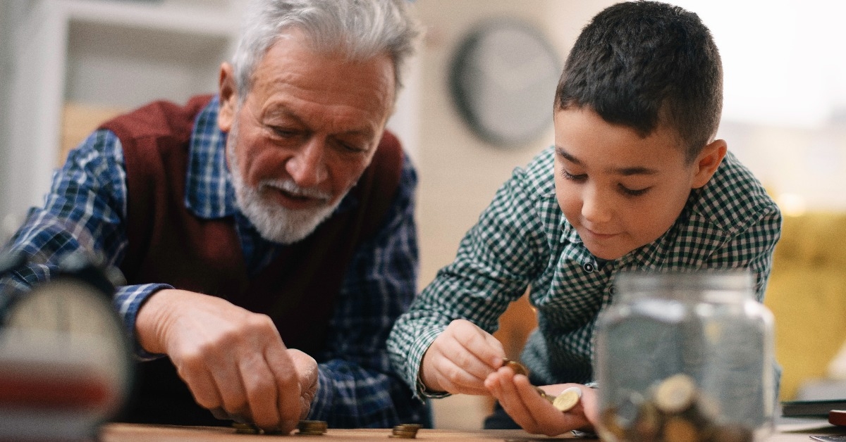 grandpa and grandson saving money