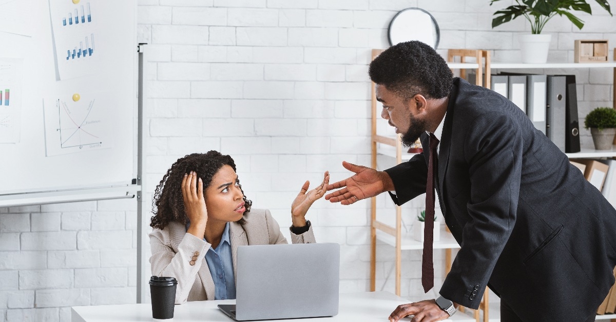 coworkers arguing with each other at office