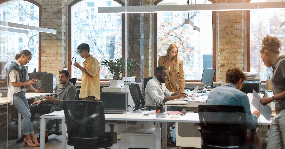 group of young mixed race business people working together 