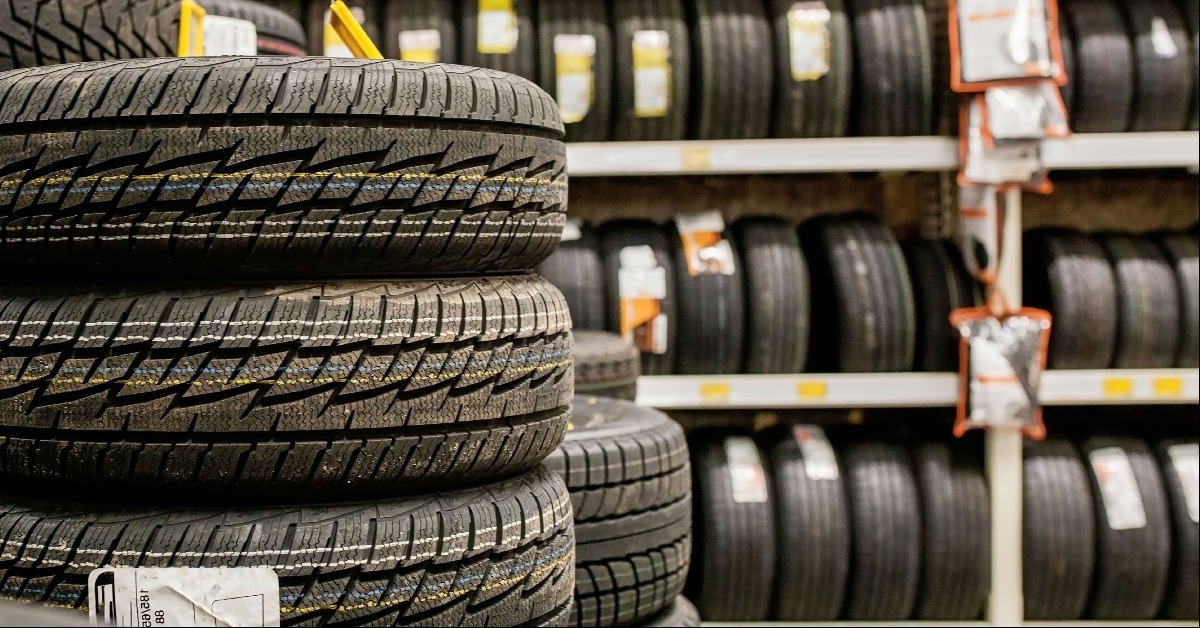 car tires and wheels at warehouse in tire store