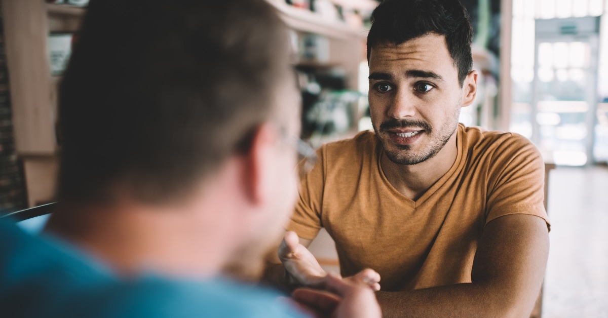male colleagues discussing information for startup project