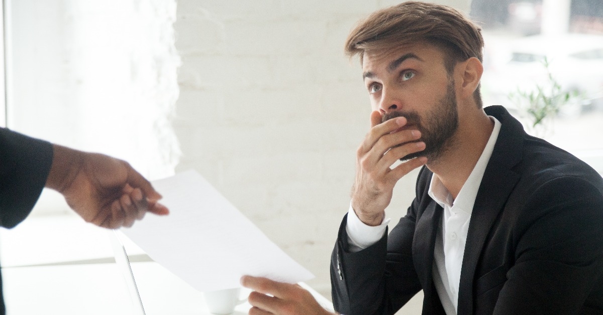 male worker getting dismissal notice