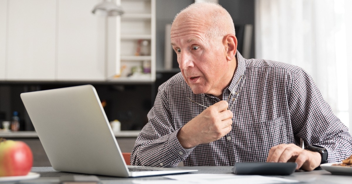 senior man worried about bills and savings