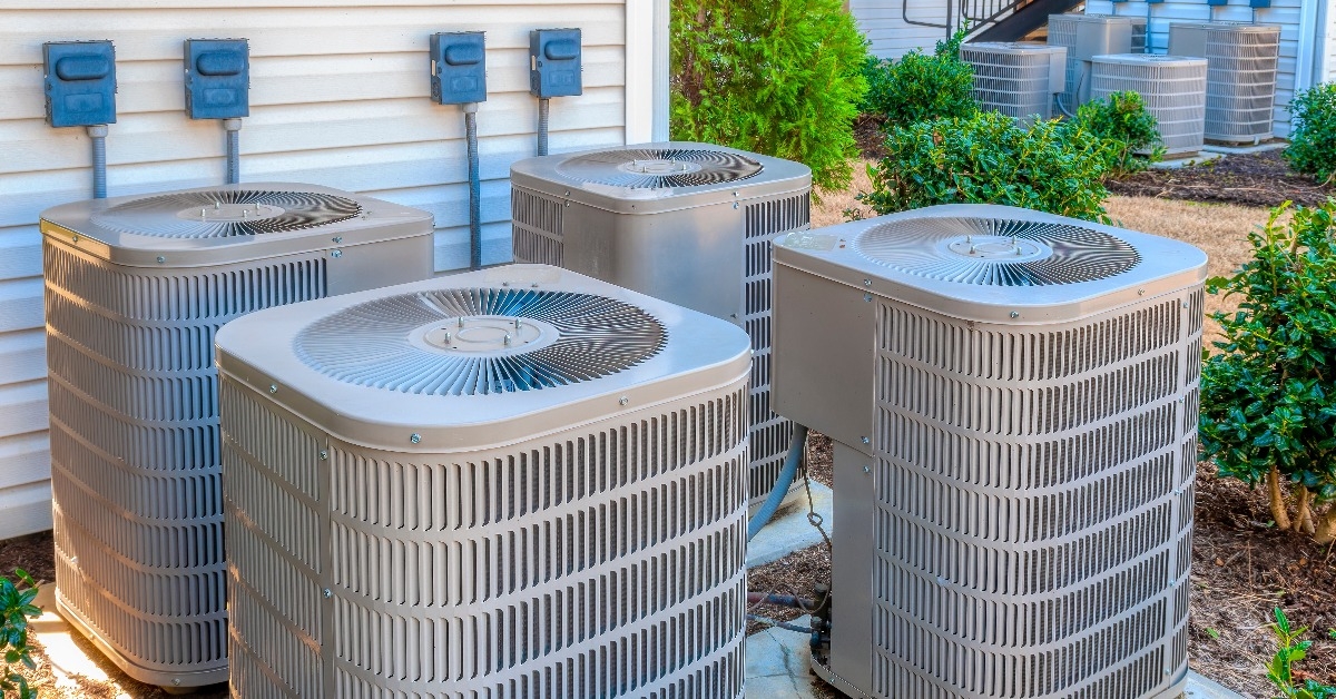 air conditioners outside upscale apartment complex