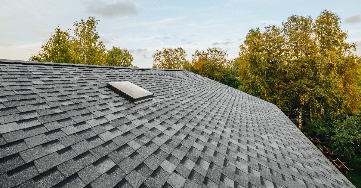 newly renovated roof covered with shingles flat polymeric roof-tiles