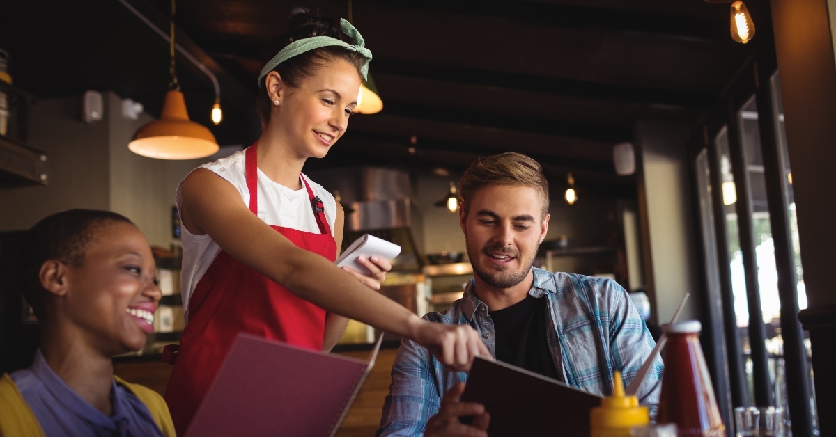 Waitress taking order at restaurant