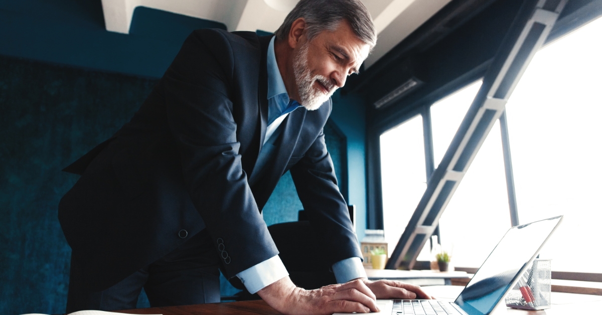 businessman in office using laptop