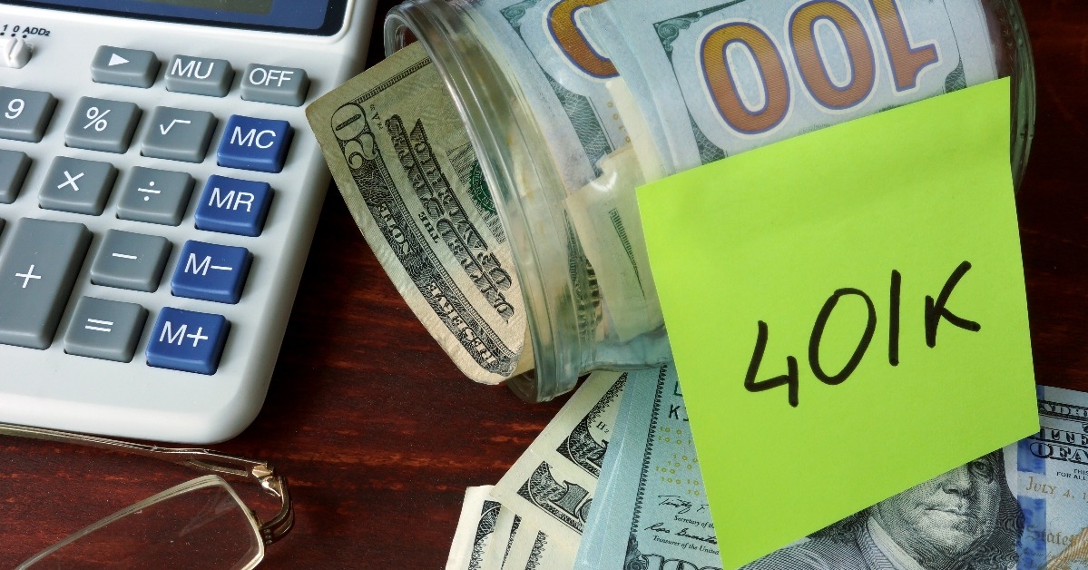 jar with label 401k and money on the table