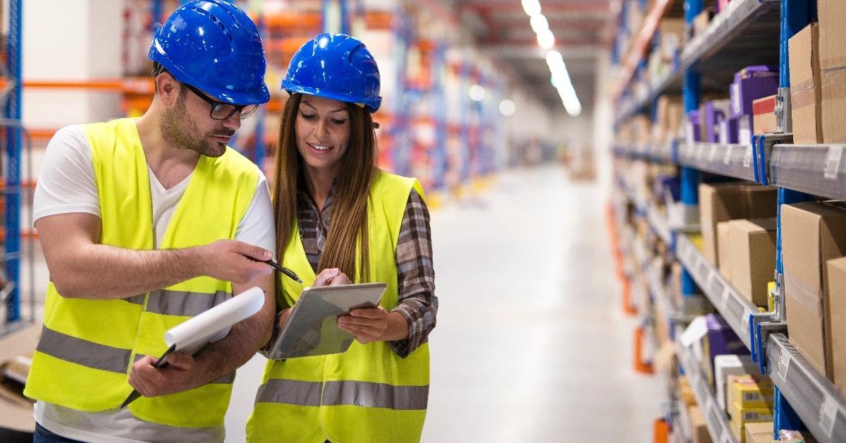 warehouse workers checking inventory 