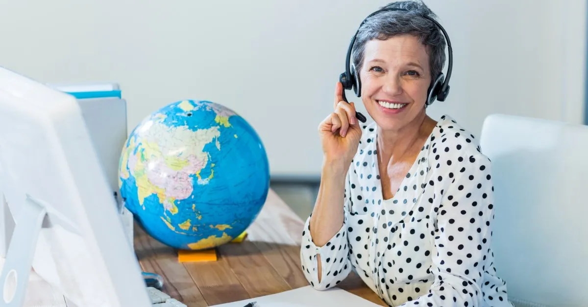 senior women wearing headphones smiling