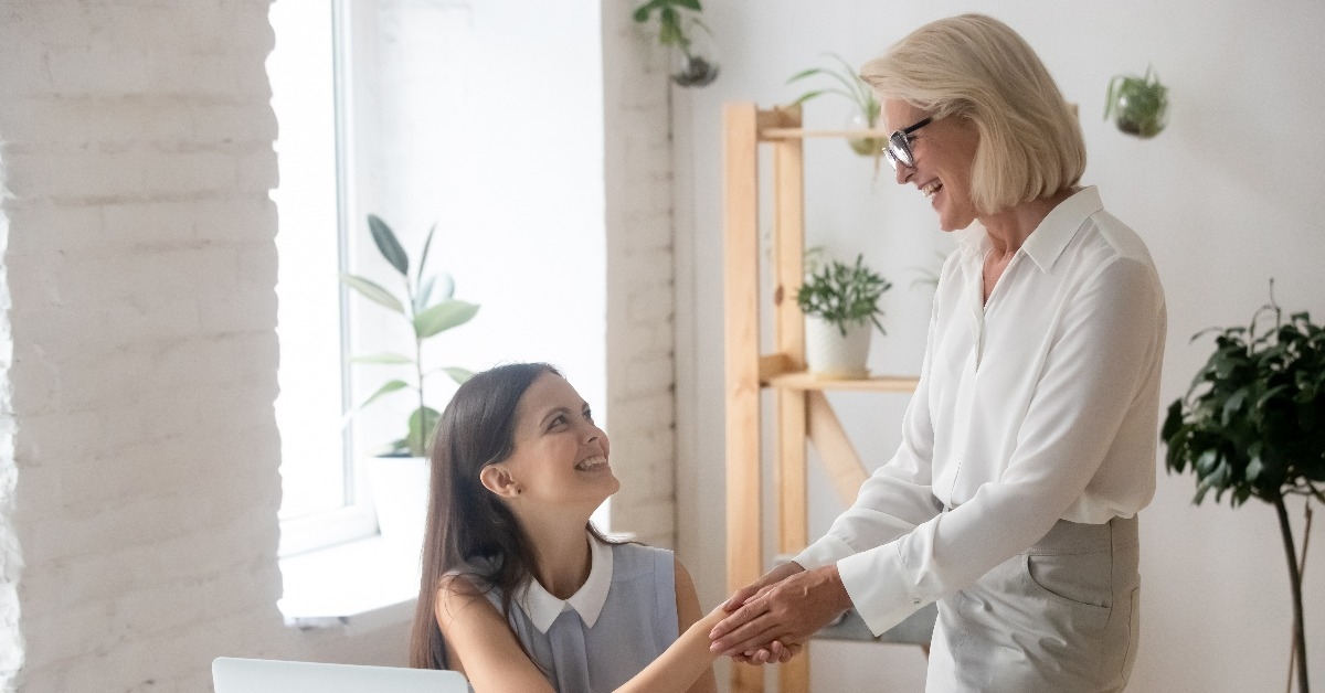 employee sitting at workplace desk