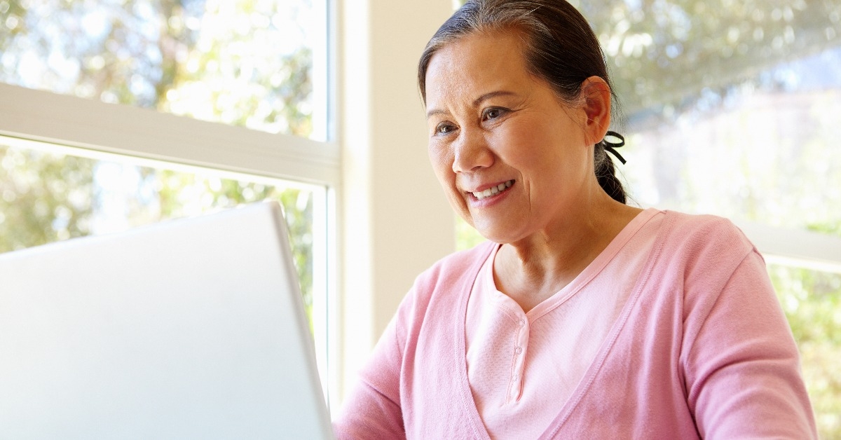 senior woman working on laptop