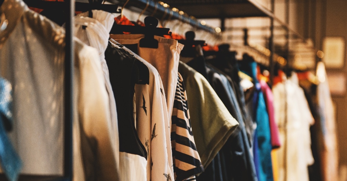 clothes on racks in a fashion boutique