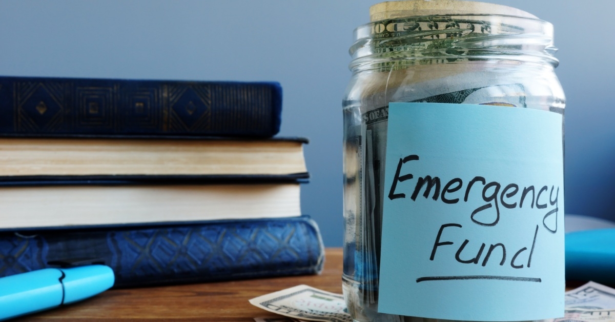 glass jar filled with dollars 