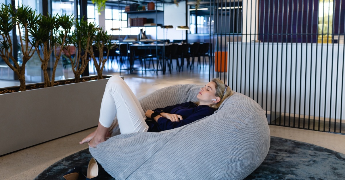 woman chilling on a bean bag 
