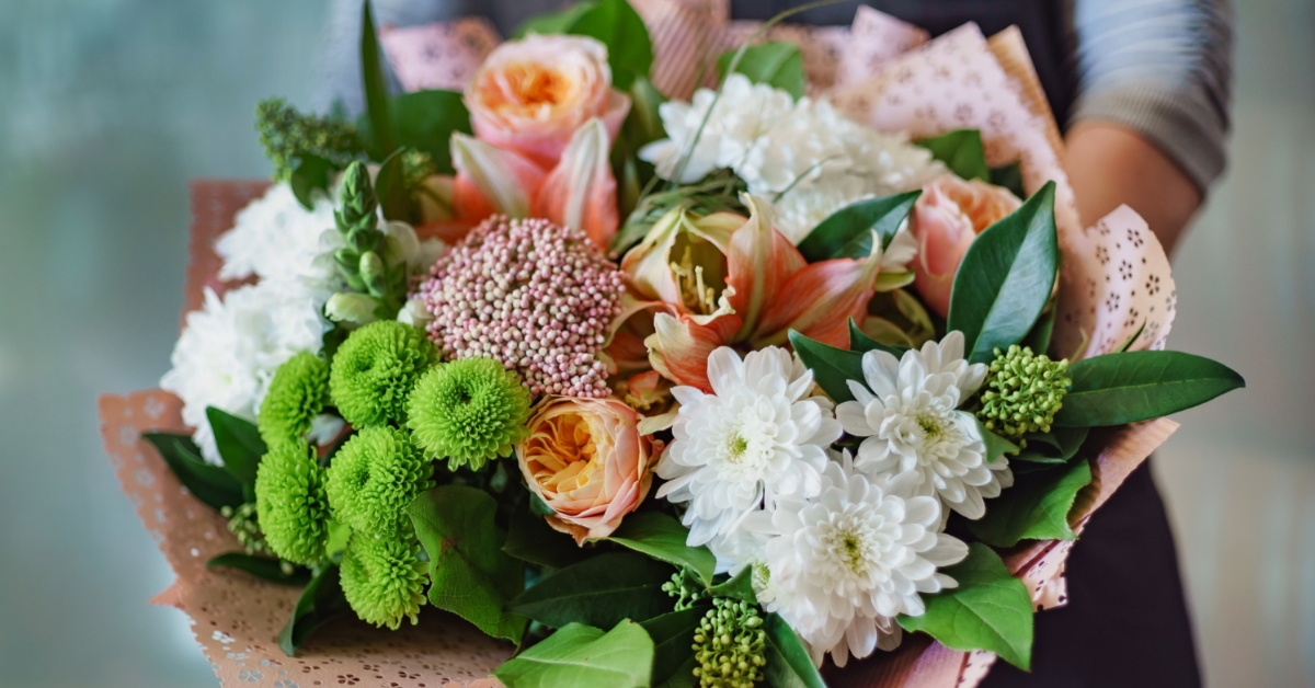 bouquet of beautiful and colourful flowers in hands