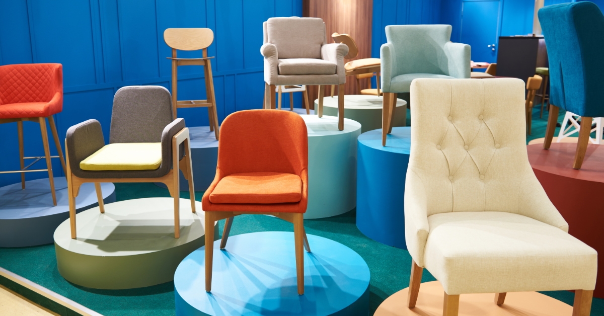 various kinds of couches and chairs in a furniture showroom