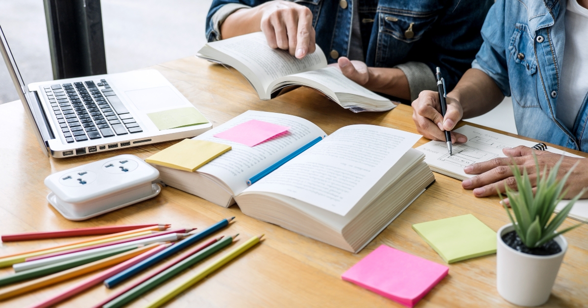 high school students studying in the library