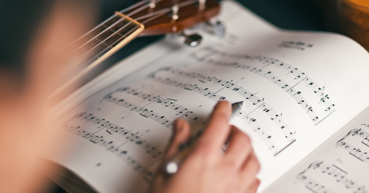 photograph of a person who studies musical score