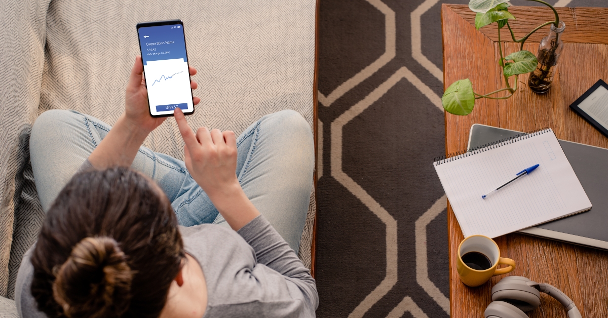 woman using investment mobile app