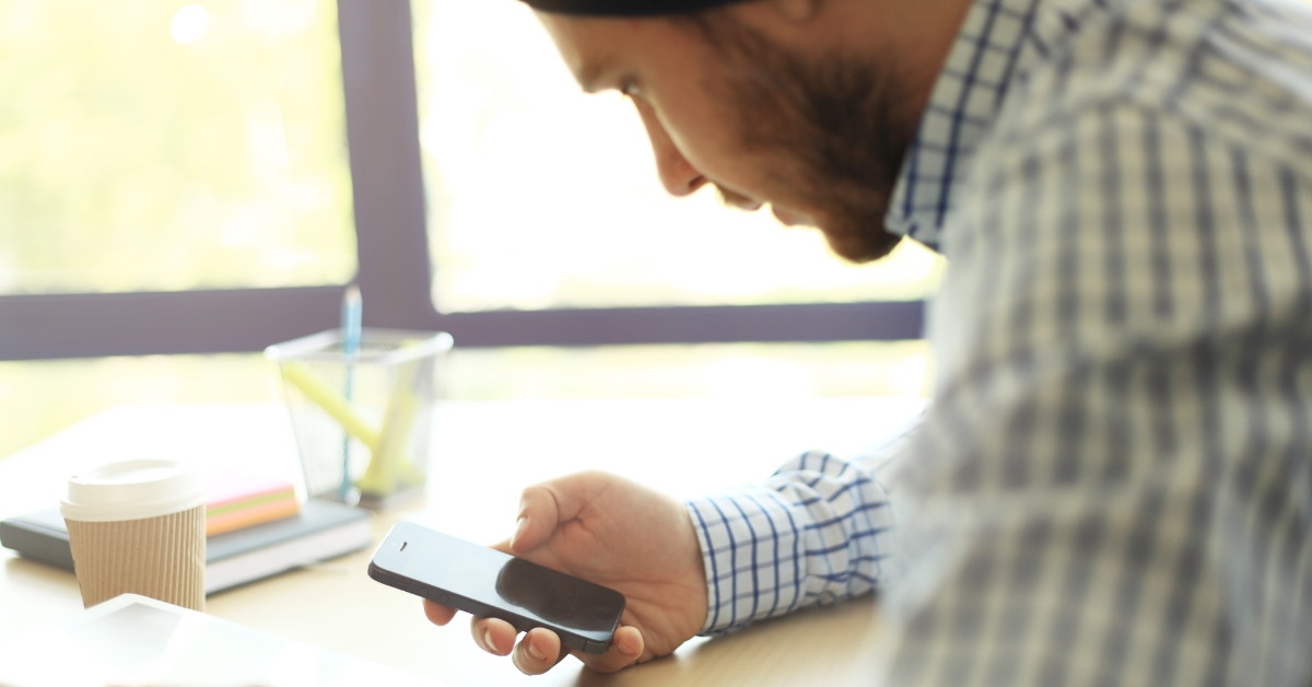 young man using smartphone 