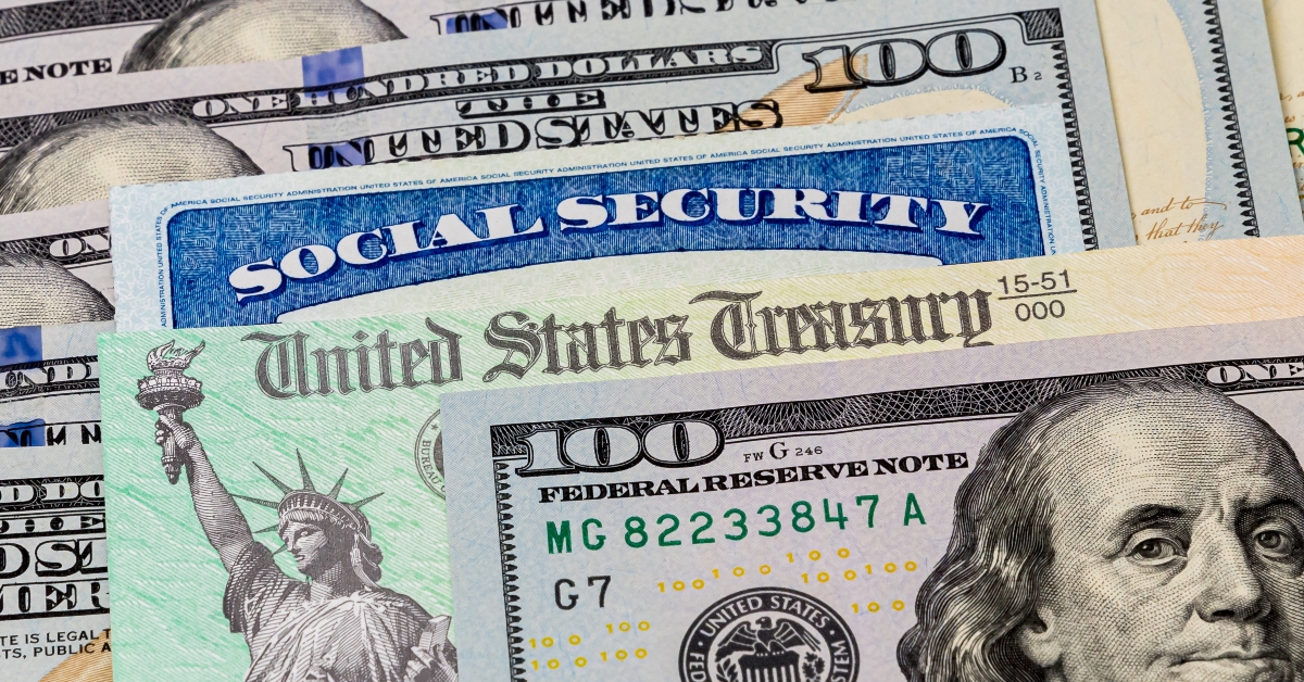 Social Security card treasury check and 100 dollar bills