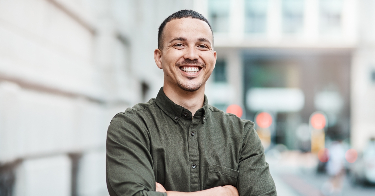businessman standing with arms crossed