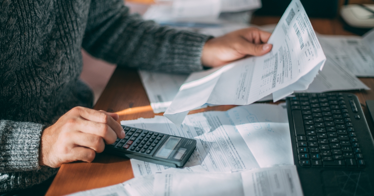 male hands with a utility bill