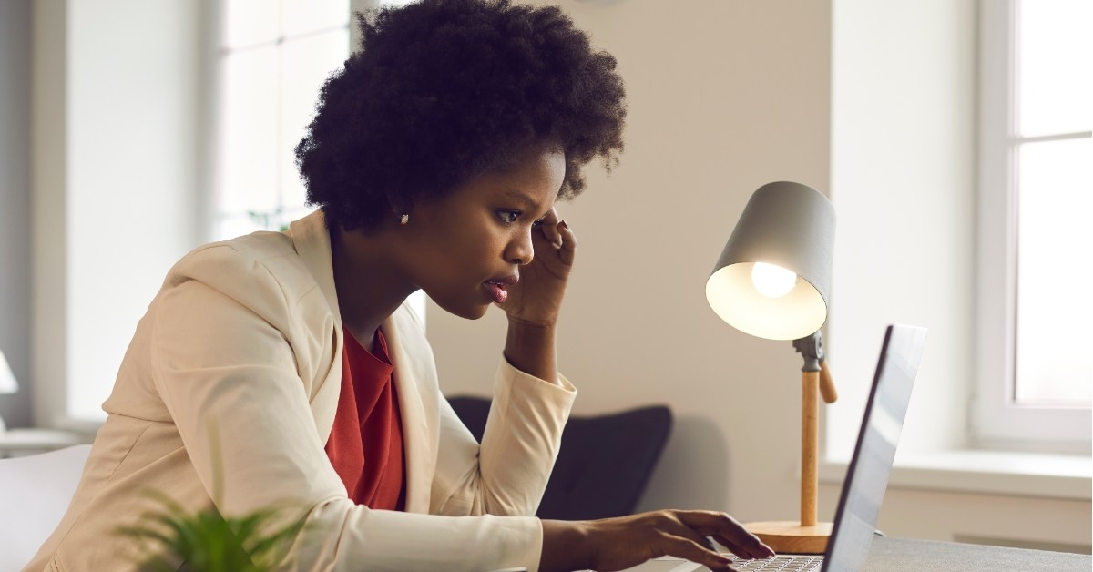 young african american female working on laptop