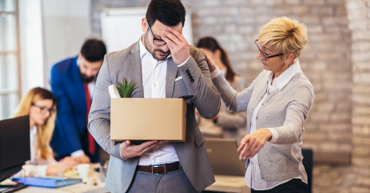 junior office worker gets fired by senior female manager