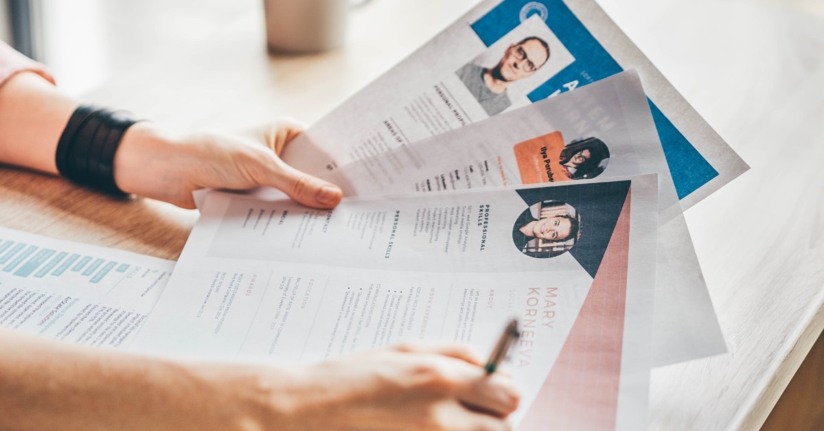 manager with different portfolios in hand