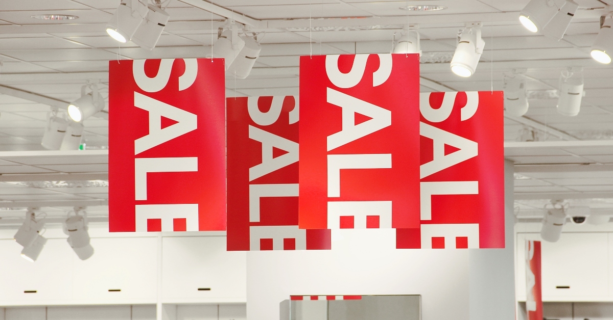 sale signs in a clothing store