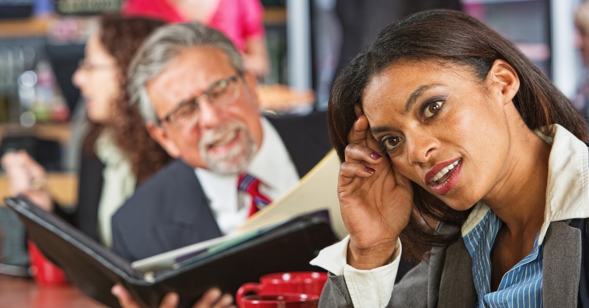 woman ignoring businessman