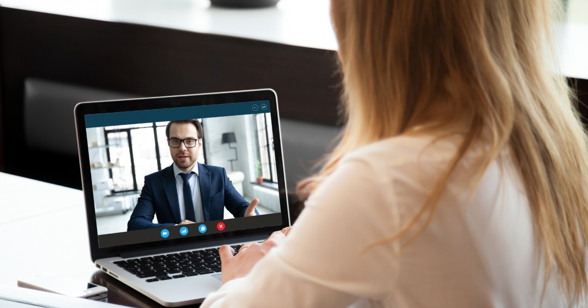 young employee attending a video meeting