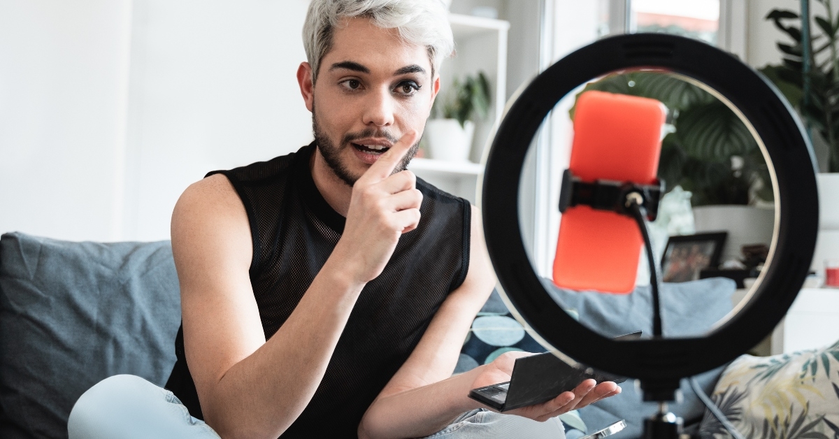 transgender influencer streaming online makeup video tutorial