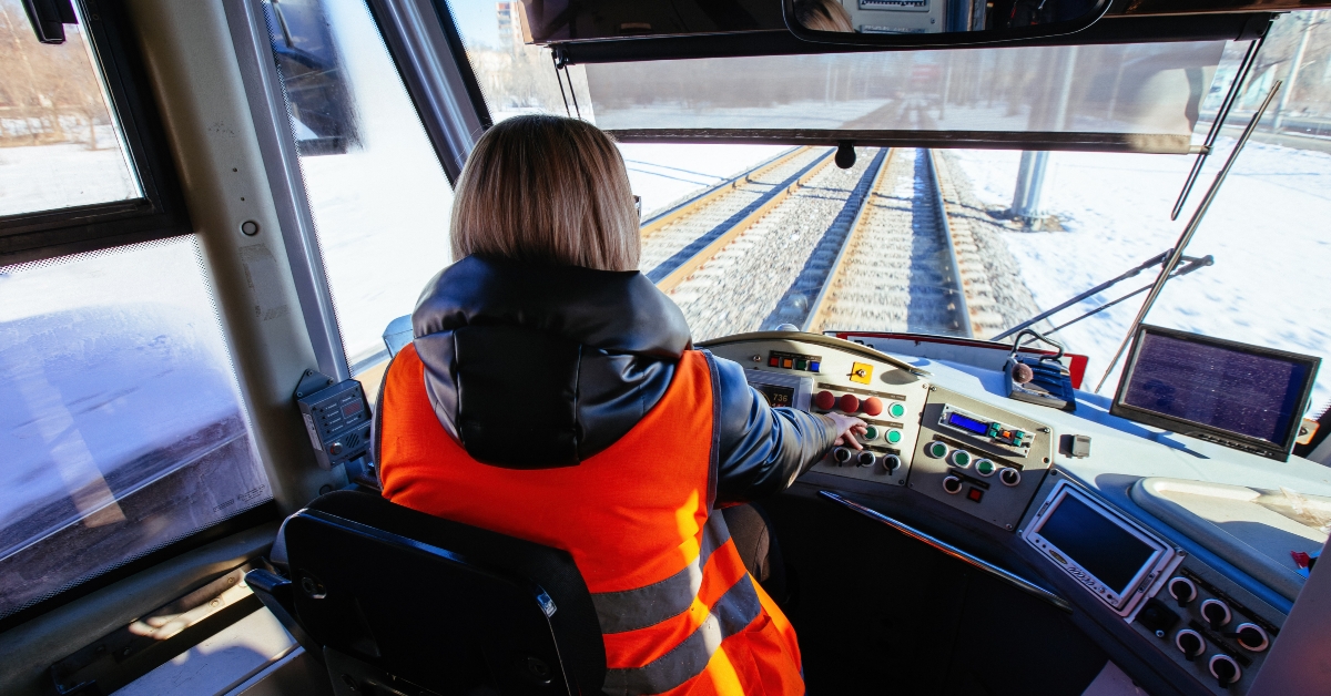 female tram driver on workplace