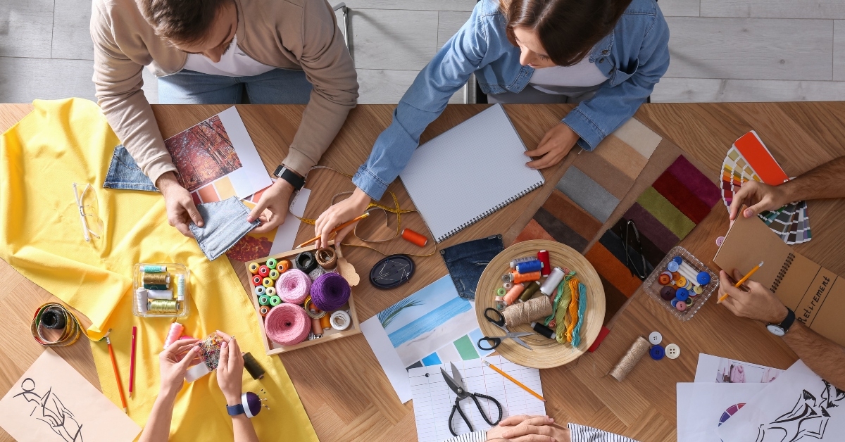 fashion designer creating new clothes in studio