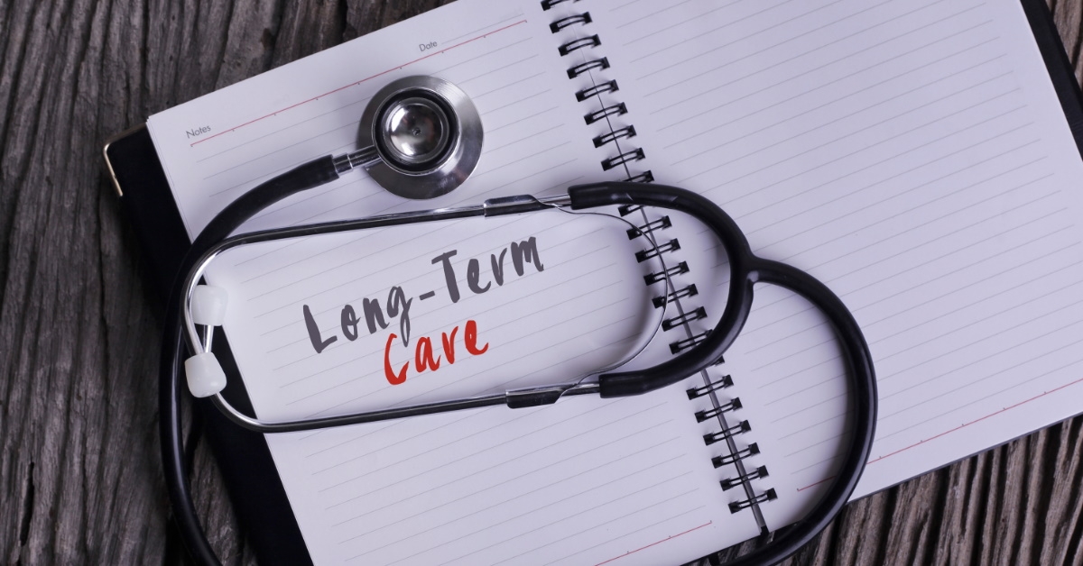 stethoscope on notebook with long term care note