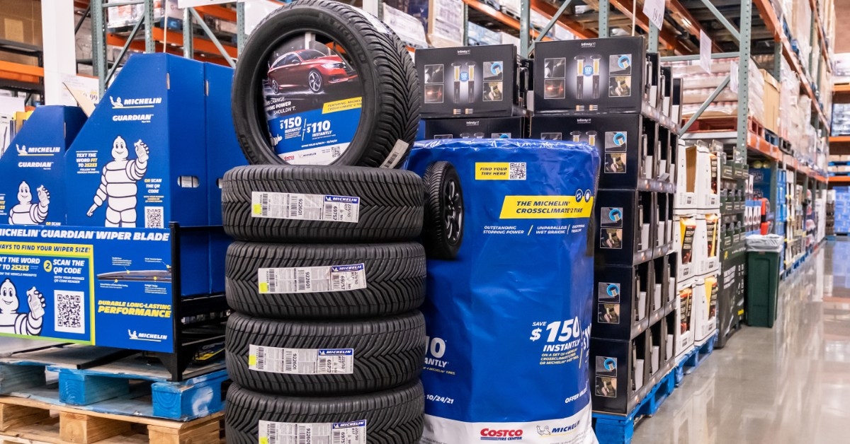 pile of michelin tyres for sale in display at costco wholesale store in sacramento