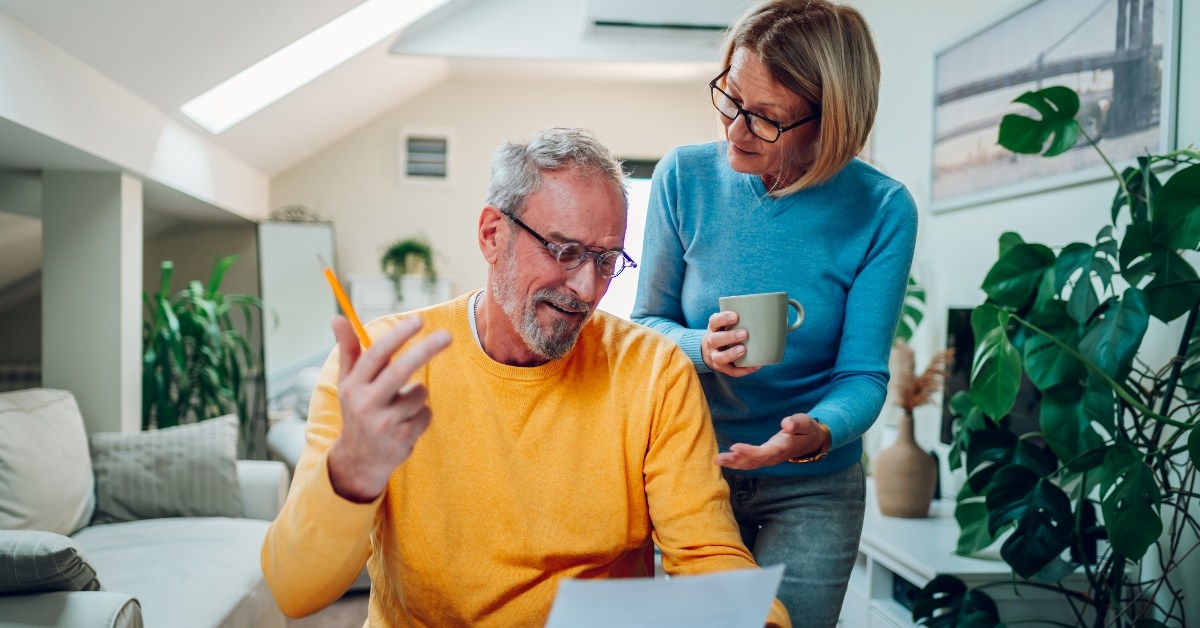 senior couple reviewing documents 