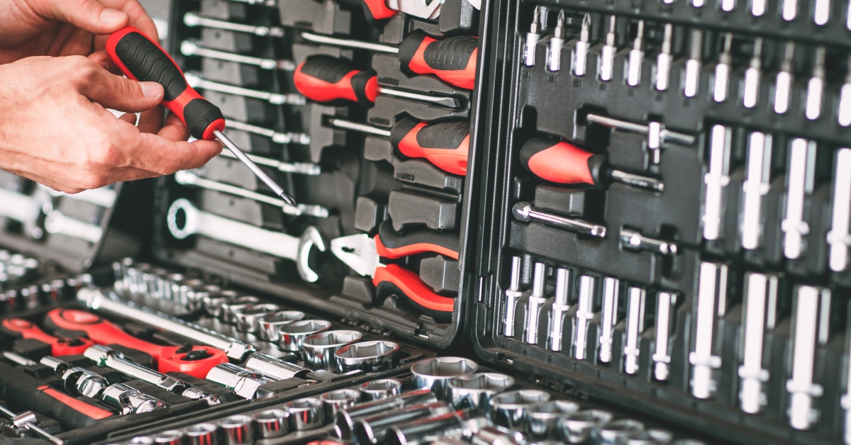 repairman choosing screwdriver