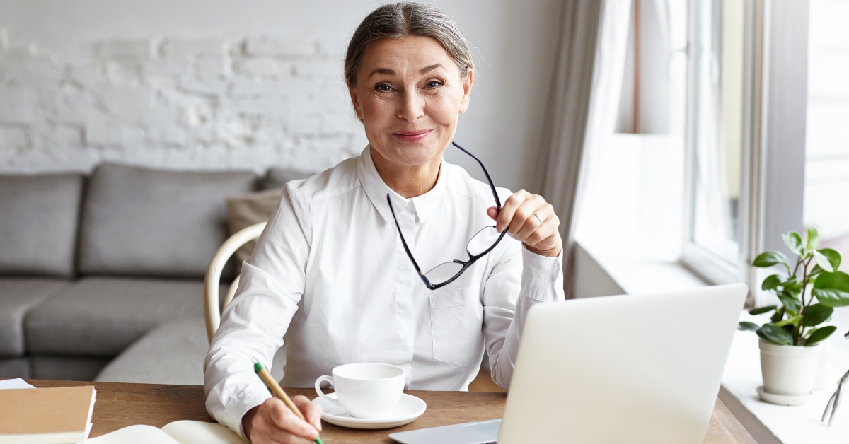 business coach enjoying creative process of making new text