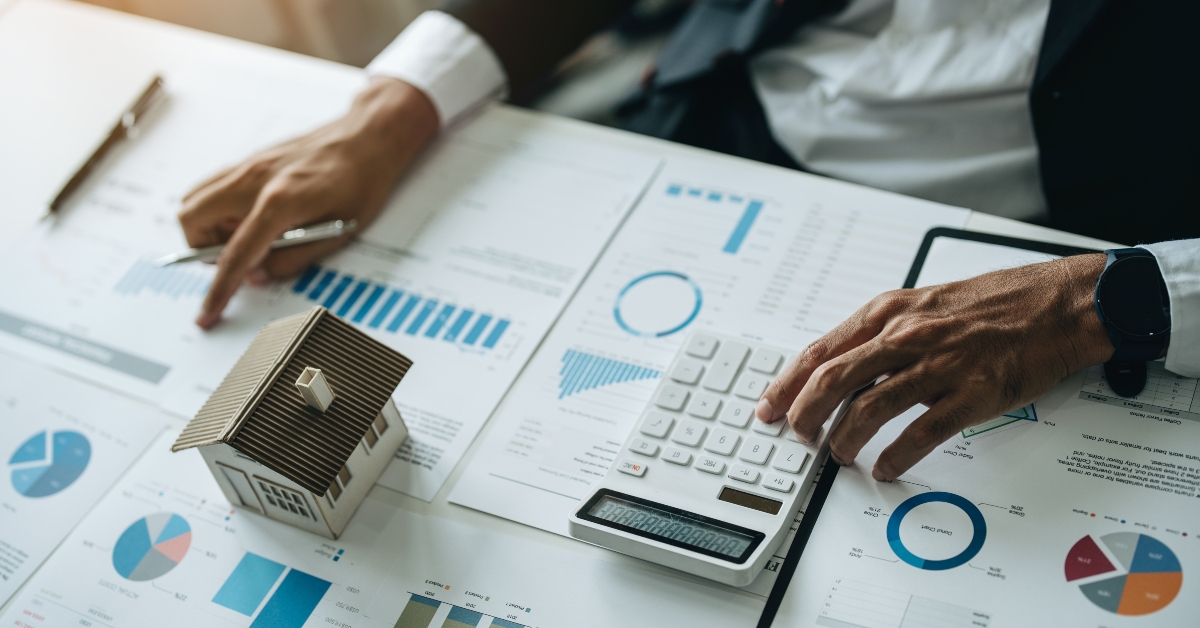 bank loan worker calculates home loan interest rates