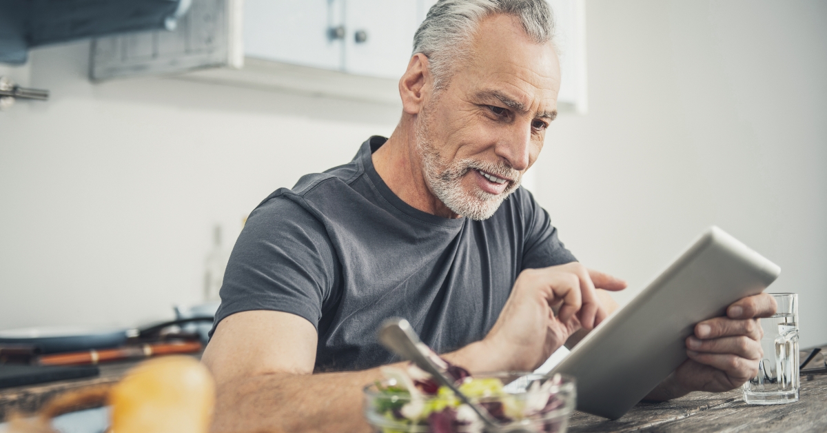 experienced businessman having dinner at home