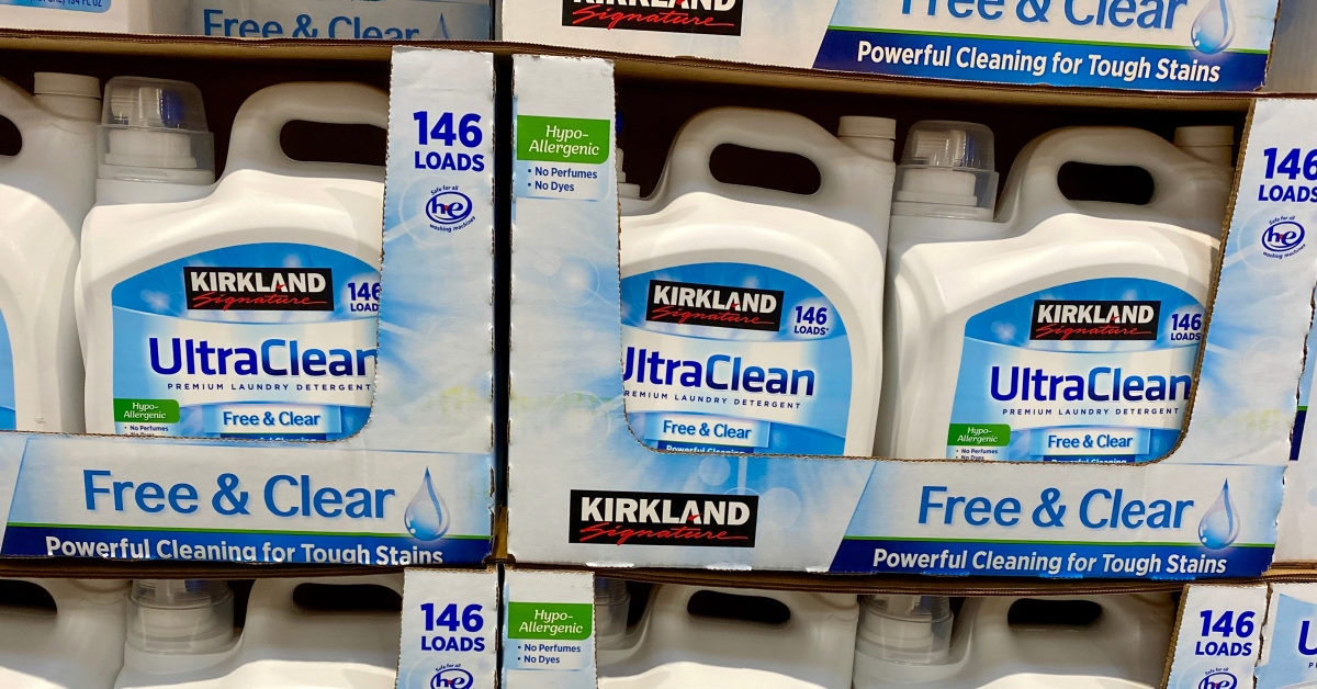 bottles of detergents on shelves by kirkland at costco wholesale store